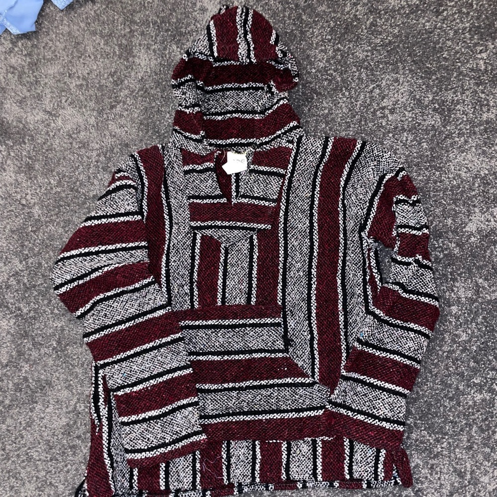 Red and black “drug rug”